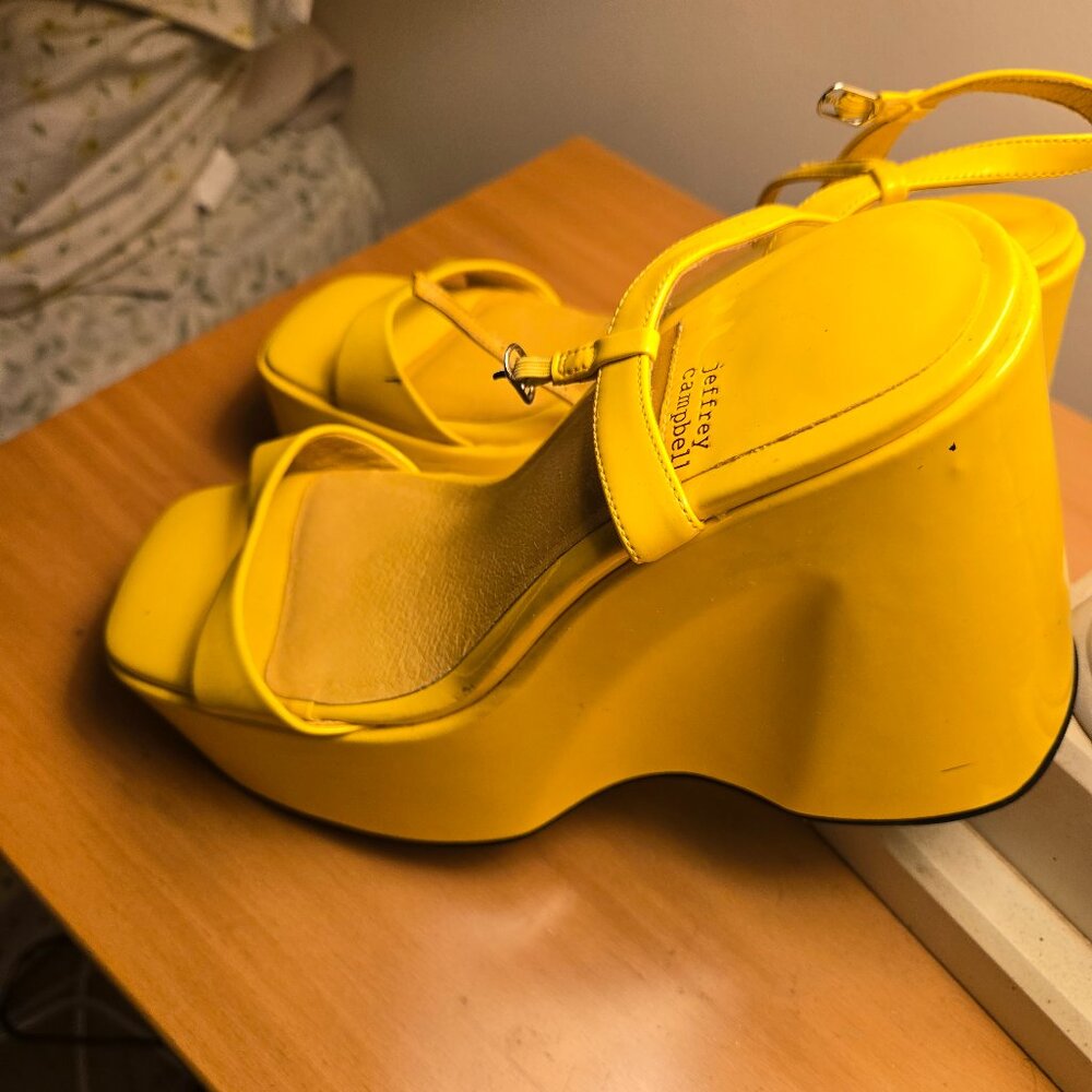 Jeffrey  Campell, nice balanced, light weight, great platform.  Deep Yellow